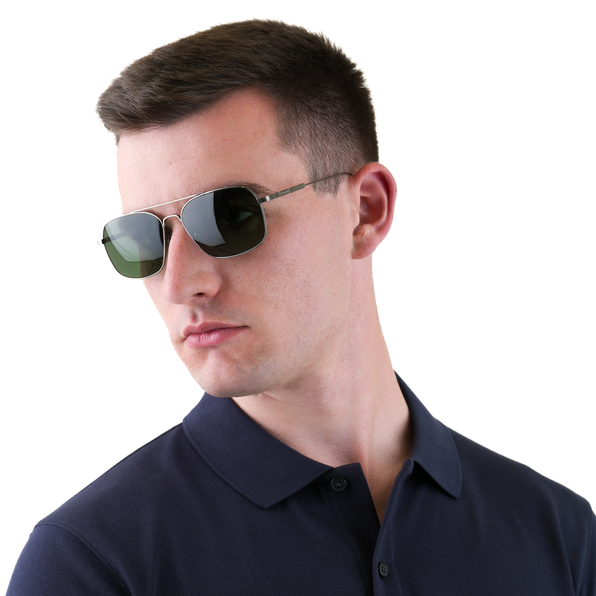 A man wearing aviator sunglasses with dark lenses and thin metal frames, paired with a dark navy polo shirt, photographed against a solid white background.