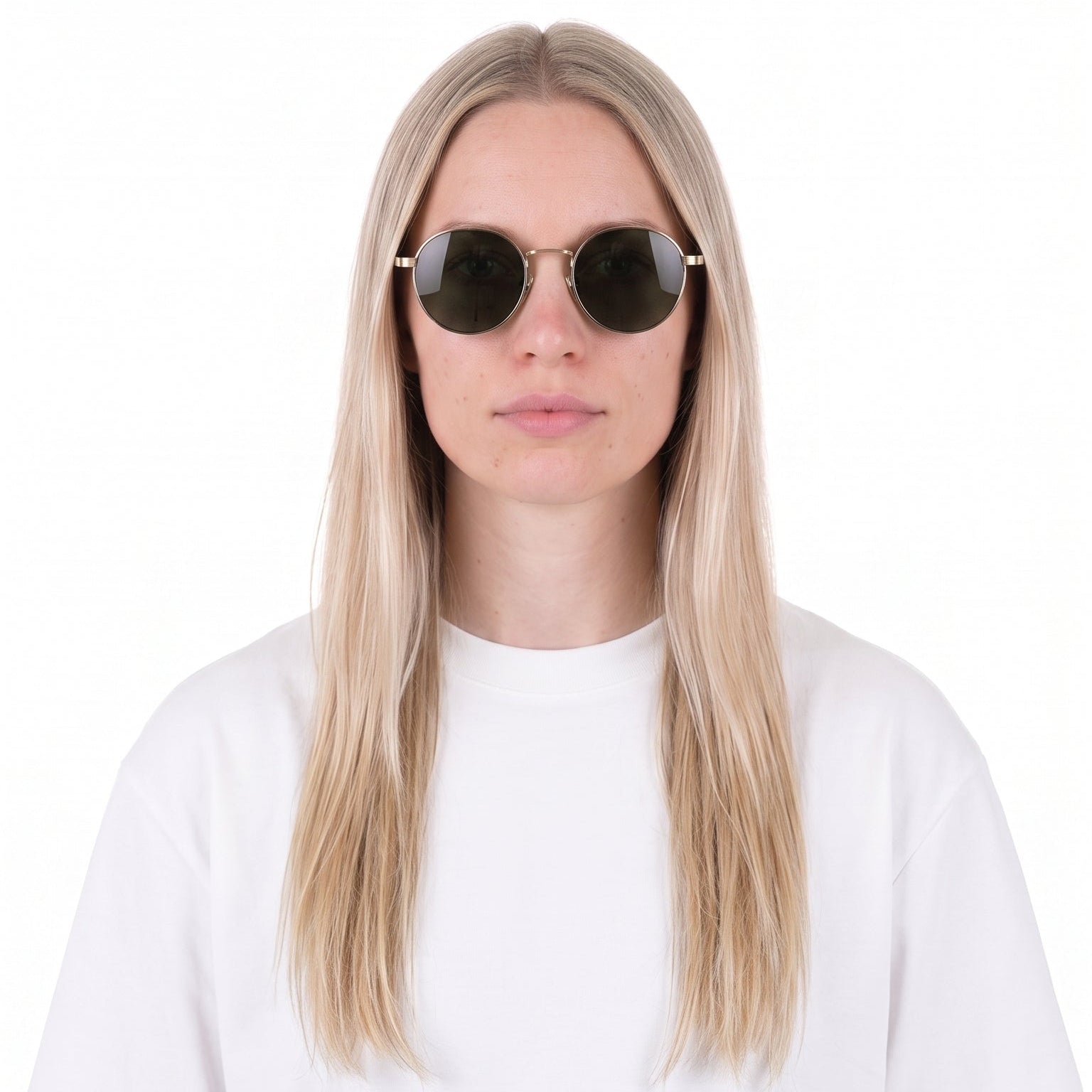 A woman with long blonde hair wearing a plain white short-sleeve t-shirt and round black sunglasses, shown against a solid white background.